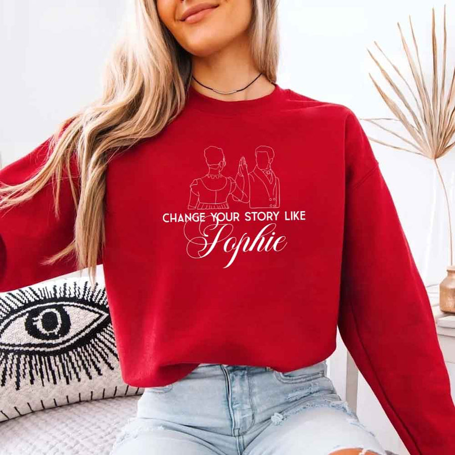 May include a person wearing a Red Change Your Story Like Sophie Crewneck Sweatshirt featuring royal inspired graphic and classic fit.
