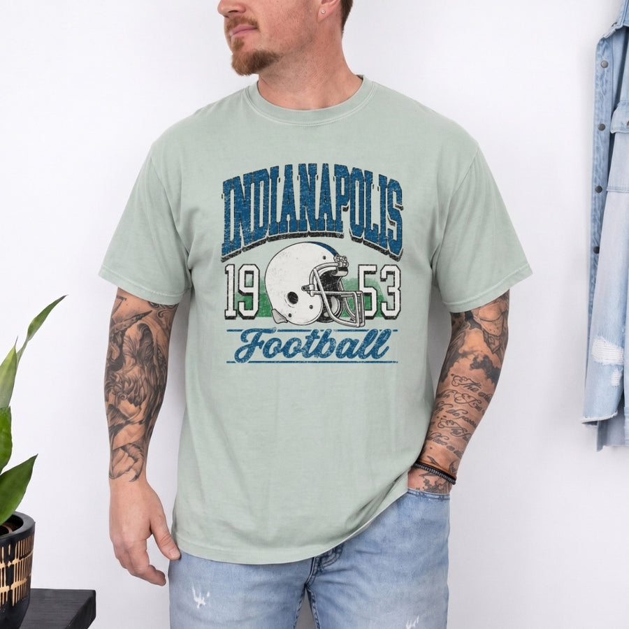 May include a City Football Comfort Colors T-Shirt featuring a football-inspired city graphic, relaxed unisex fit, and casual game-day style.