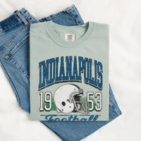 May include a City Football Comfort Colors T-Shirt featuring a football-inspired city graphic, relaxed unisex fit, and casual game-day style.