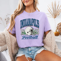 May include a City Football Comfort Colors T-Shirt featuring a football-inspired city graphic, relaxed unisex fit, and casual game-day style.