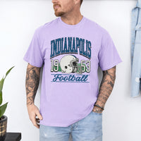 May include a City Football Comfort Colors T-Shirt featuring a football-inspired city graphic, relaxed unisex fit, and casual game-day style.