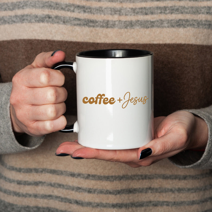 May include a Coffee + Jesus 11oz Mug featuring a simple Christian faith and coffee-inspired statement design on a ceramic cup.