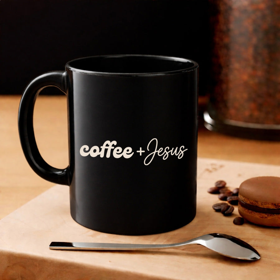 May include a Coffee + Jesus 11oz Mug featuring a simple Christian faith and coffee-inspired statement design on a ceramic cup.