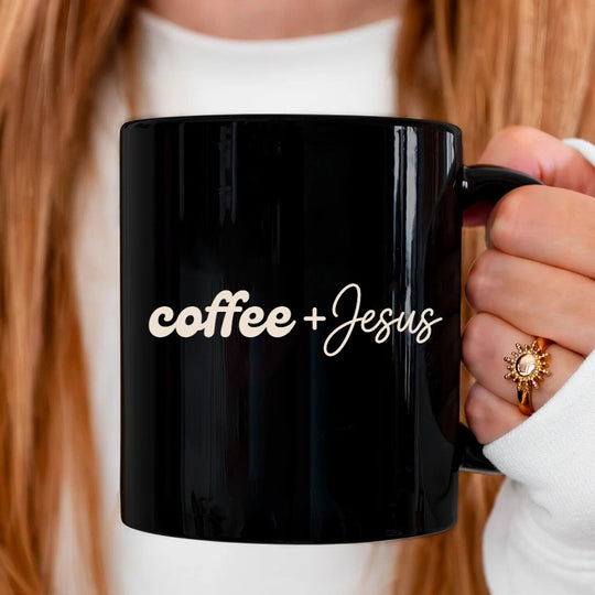 May include a Coffee + Jesus 11oz Mug featuring a simple Christian faith and coffee-inspired statement design on a ceramic cup.