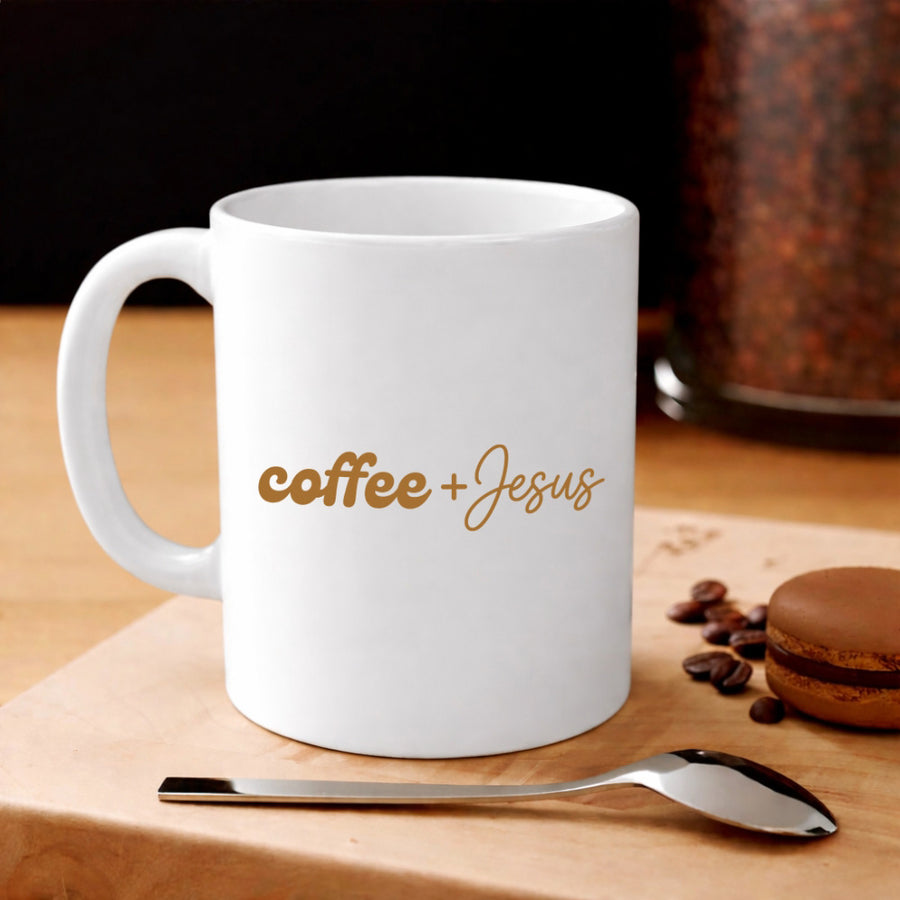 May include a Coffee + Jesus 11oz Mug featuring a simple Christian faith and coffee-inspired statement design on a ceramic cup.