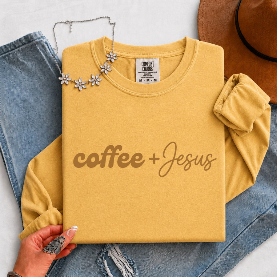 May include a Coffee + Jesus Comfort Colors Long Sleeve Shirt featuring a simple Christian faith and coffee-inspired statement design.