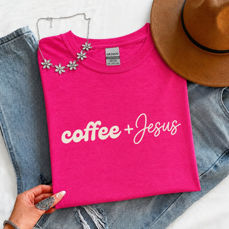 May include a Coffee + Jesus T-Shirt featuring a simple Christian faith and coffee-inspired statement design on a casual short-sleeve tee.