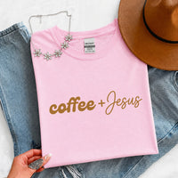 May include a Coffee + Jesus T-Shirt featuring a simple Christian faith and coffee-inspired statement design on a casual short-sleeve tee.