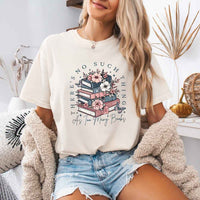 May include a Comfort Colors floral book lover T-shirt featuring a charming literary-inspired design with blooming flowers and book-themed artwork. This garment-dyed tee offers a relaxed fit for everyday comfort.