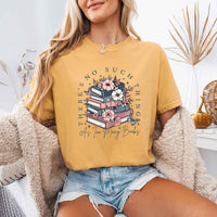 May include a Comfort Colors floral book lover T-shirt featuring a charming literary-inspired design with blooming flowers and book-themed artwork. This garment-dyed tee offers a relaxed fit for everyday comfort.