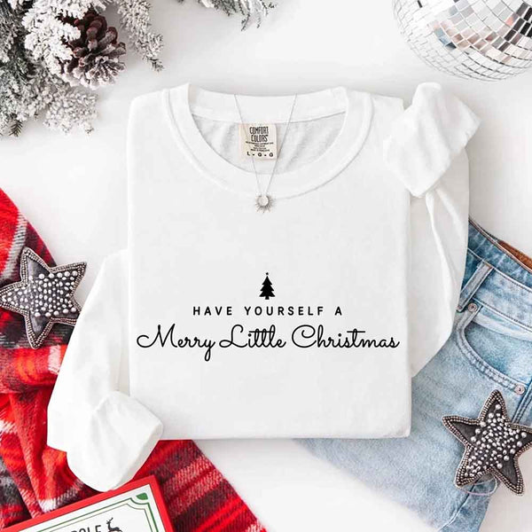 May include a Comfort Colors long sleeve shirt featuring the phrase “Have Yourself a Merry Christmas” in festive print, displayed flat with soft cotton texture and seasonal tones.