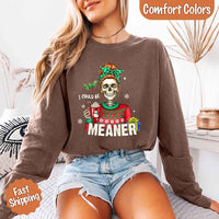 May include a Comfort Colors long sleeve shirt featuring the phrase “I Could Be Meaner” in festive Christmas design, displayed flat with soft cotton texture and holiday accents.