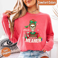 May include a Comfort Colors long sleeve shirt featuring the phrase “I Could Be Meaner” in festive Christmas design, displayed flat with soft cotton texture and holiday accents.