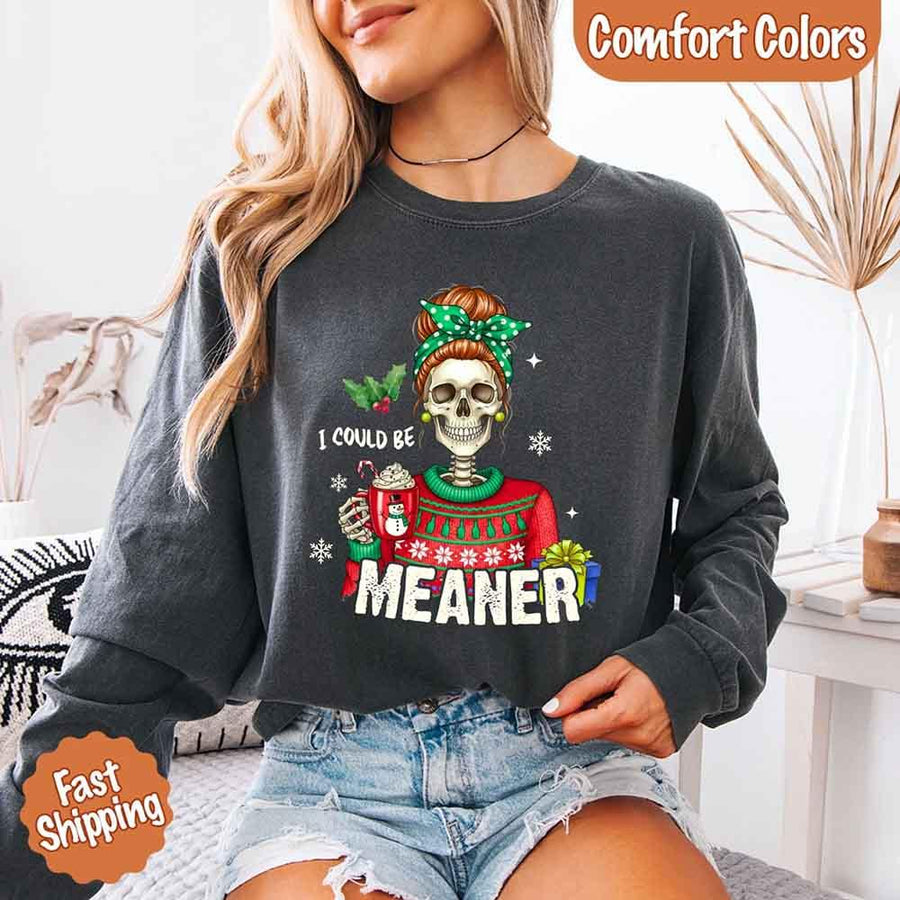 May include a Comfort Colors long sleeve shirt featuring the phrase “I Could Be Meaner” in festive Christmas design, displayed flat with soft cotton texture and holiday accents.