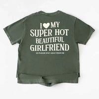 May include a Comfort Colors short-sleeve T-shirt with the phrase I Love My Super Hot Beautiful Girlfriend printed clearly on the front.
