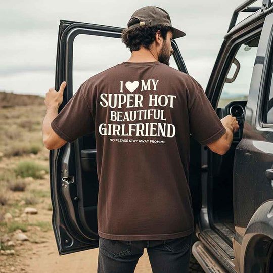 May include a Comfort Colors short-sleeve T-shirt with the phrase I Love My Super Hot Beautiful Girlfriend printed clearly on the front.