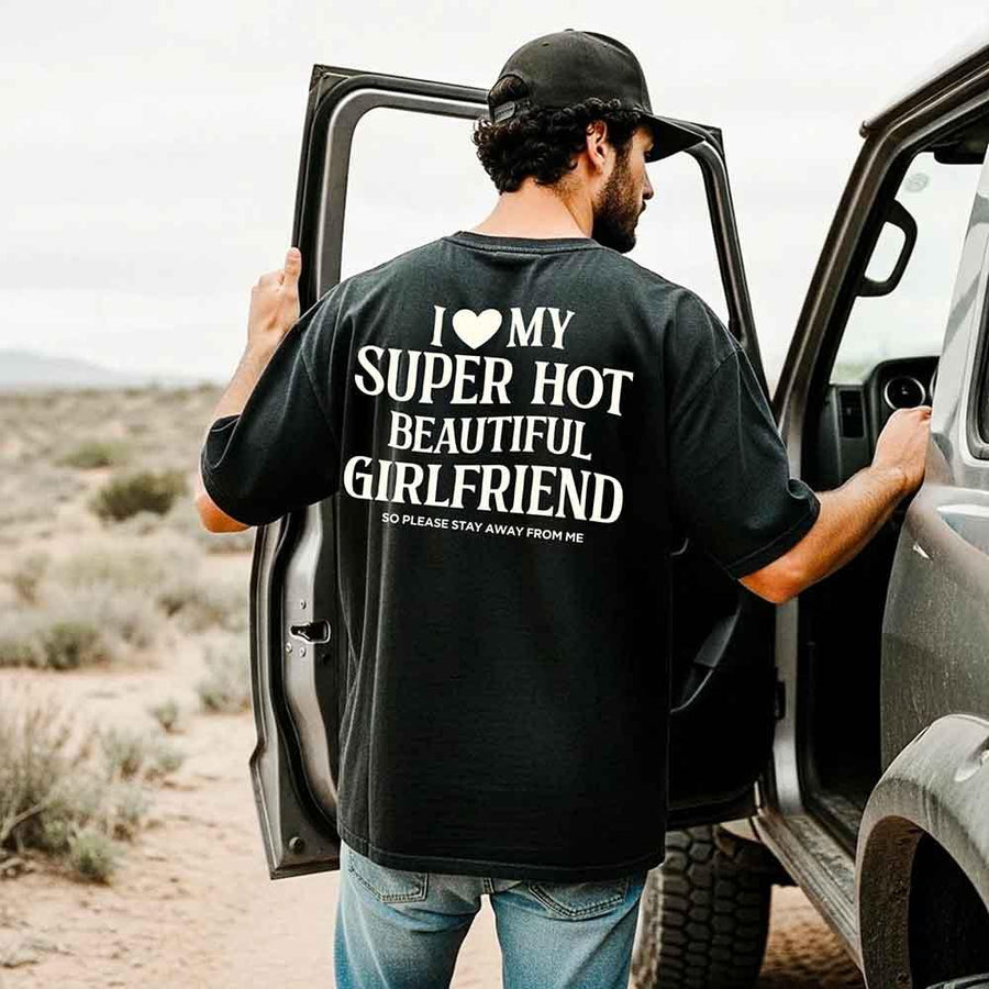 May include a Comfort Colors short-sleeve T-shirt with the phrase I Love My Super Hot Beautiful Girlfriend printed clearly on the front.