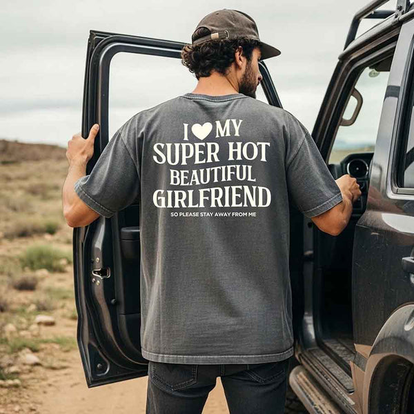 May include a Comfort Colors short-sleeve T-shirt with the phrase I Love My Super Hot Beautiful Girlfriend printed clearly on the front.