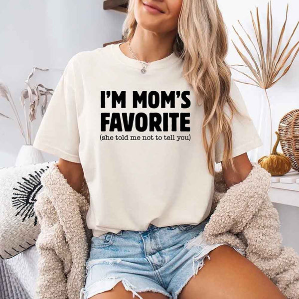 May include a Comfort Colors short-sleeve T-shirt with the phrase I’m Mom’s Favorite printed clearly on the front.