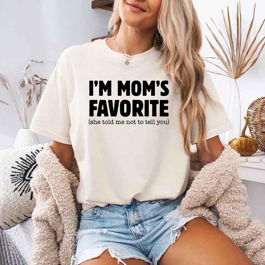 May include a Comfort Colors short-sleeve T-shirt with the phrase I’m Mom’s Favorite printed clearly on the front.