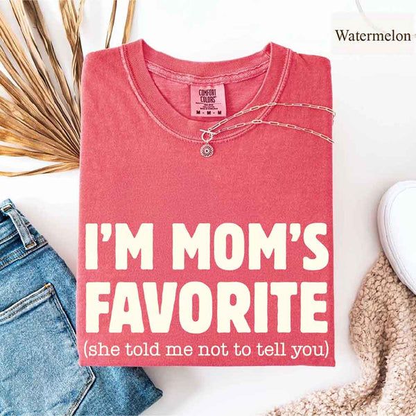 May include a Comfort Colors short-sleeve T-shirt with the phrase I’m Mom’s Favorite printed clearly on the front.