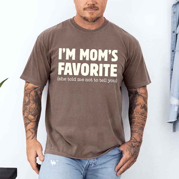 May include a Comfort Colors short-sleeve T-shirt with the phrase I’m Mom’s Favorite printed clearly on the front.