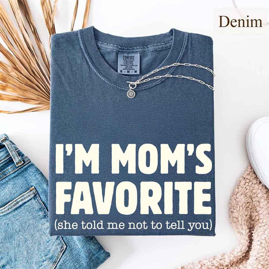 May include a Comfort Colors short-sleeve T-shirt with the phrase I’m Mom’s Favorite printed clearly on the front.