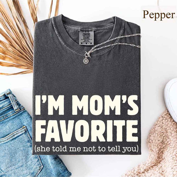 May include a Comfort Colors short-sleeve T-shirt with the phrase I’m Mom’s Favorite printed clearly on the front.