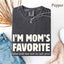 May include a Comfort Colors short-sleeve T-shirt with the phrase I’m Mom’s Favorite printed clearly on the front.