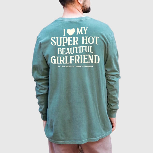 May include a Comfort Colors long sleeve T-shirt with the phrase I Love My Super Hot Beautiful Girlfriend printed at the back.