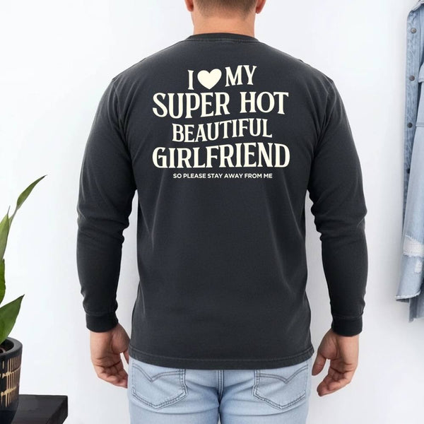 May include a Comfort Colors long sleeve T-shirt with the phrase I Love My Super Hot Beautiful Girlfriend printed at the back.