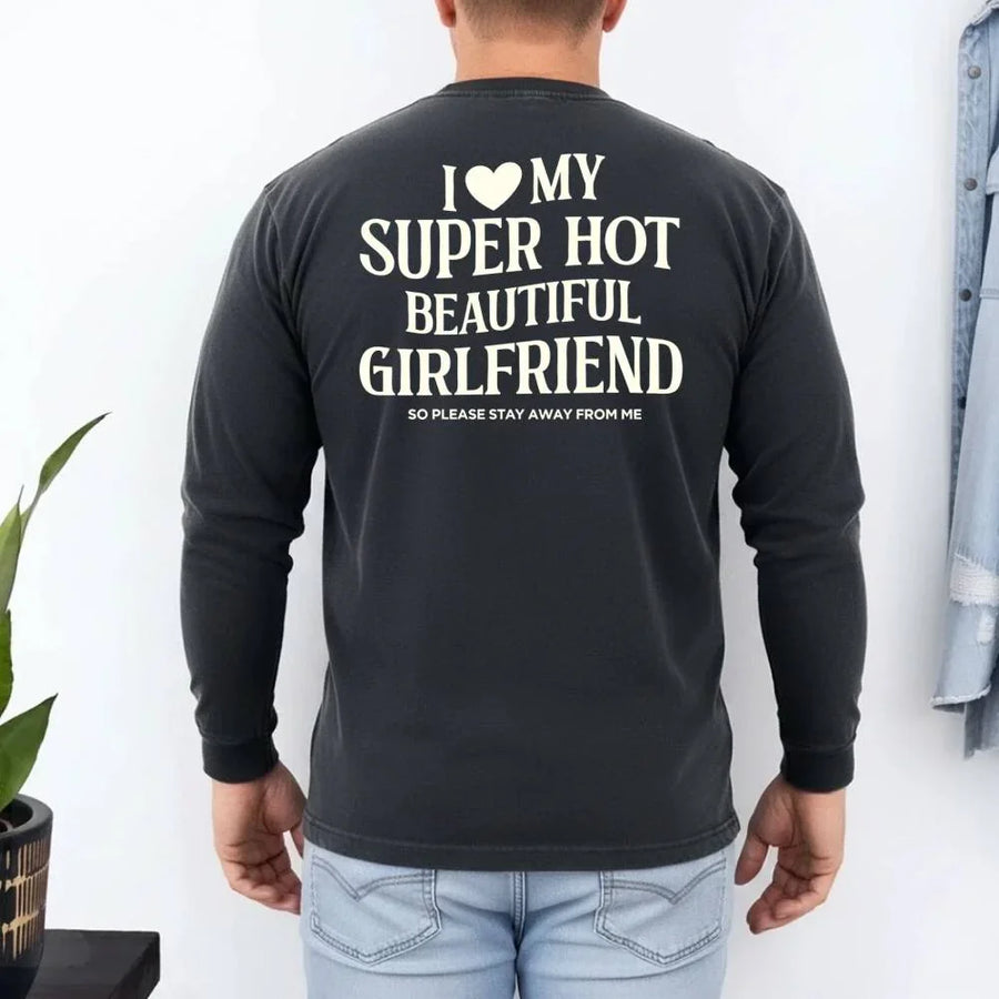 May include a Comfort Colors long sleeve T-shirt with the phrase I Love My Super Hot Beautiful Girlfriend printed at the back.