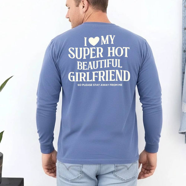 May include a Comfort Colors long sleeve T-shirt with the phrase I Love My Super Hot Beautiful Girlfriend printed at the back.