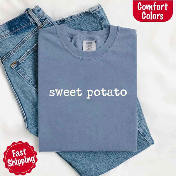 May include a pair of matching fall-themed couple t-shirts from Comfort Colors featuring playful “Sweet Potato” and “Rude Potato” designs. The shirts are styled with humorous graphics or text in warm autumn tones, perfect for couples celebrating the season with a lighthearted touch.