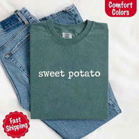 May include a pair of matching fall-themed couple t-shirts from Comfort Colors featuring playful “Sweet Potato” and “Rude Potato” designs. The shirts are styled with humorous graphics or text in warm autumn tones, perfect for couples celebrating the season with a lighthearted touch.