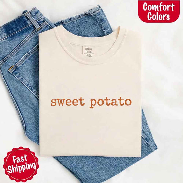 May include a pair of matching fall-themed couple t-shirts from Comfort Colors featuring playful “Sweet Potato” and “Rude Potato” designs. The shirts are styled with humorous graphics or text in warm autumn tones, perfect for couples celebrating the season with a lighthearted touch.