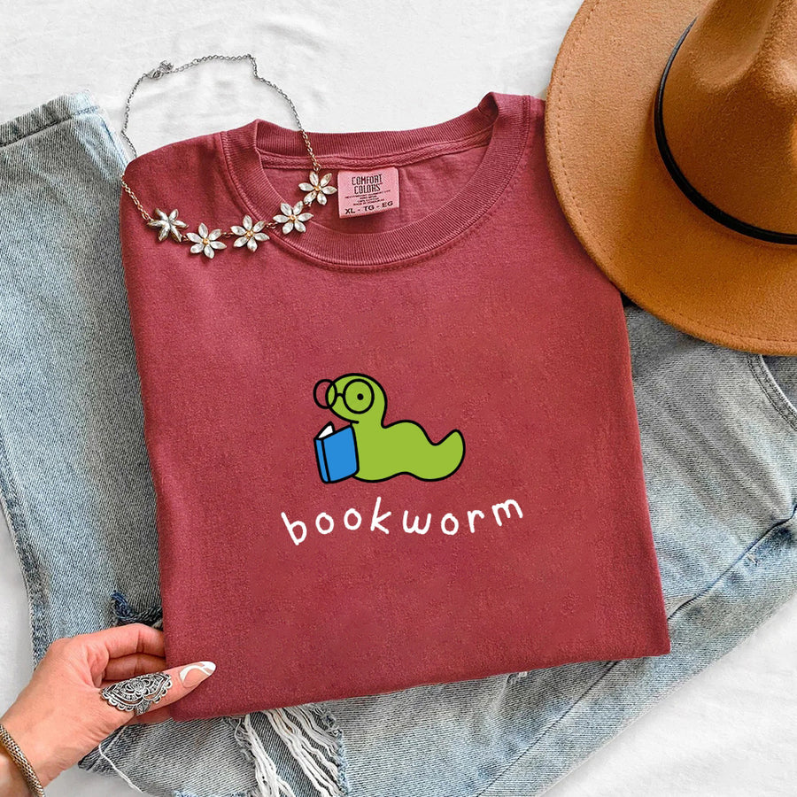 May include Bookworm Comfort Colors unisex t-shirt with book lover graphic, relaxed fit, and soft garment-dyed cotton