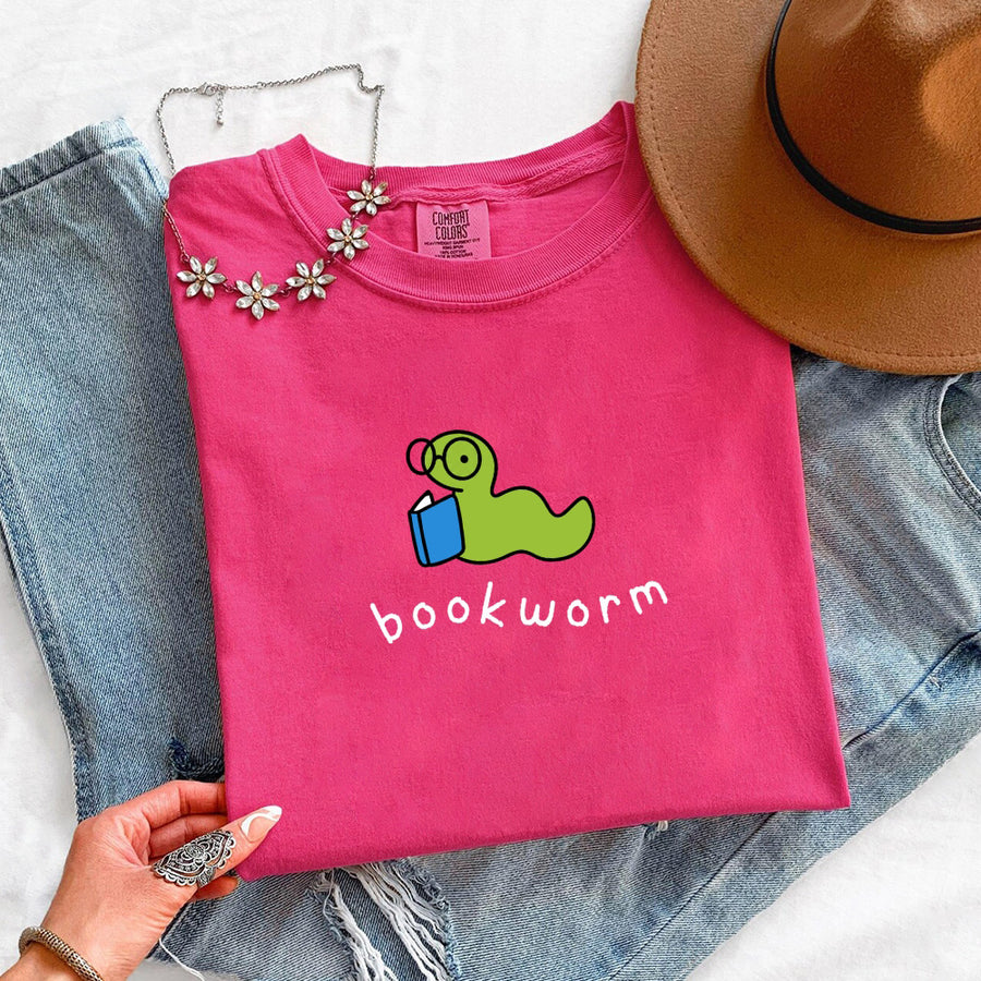 May include Bookworm Comfort Colors unisex t-shirt with book lover graphic, relaxed fit, and soft garment-dyed cotton