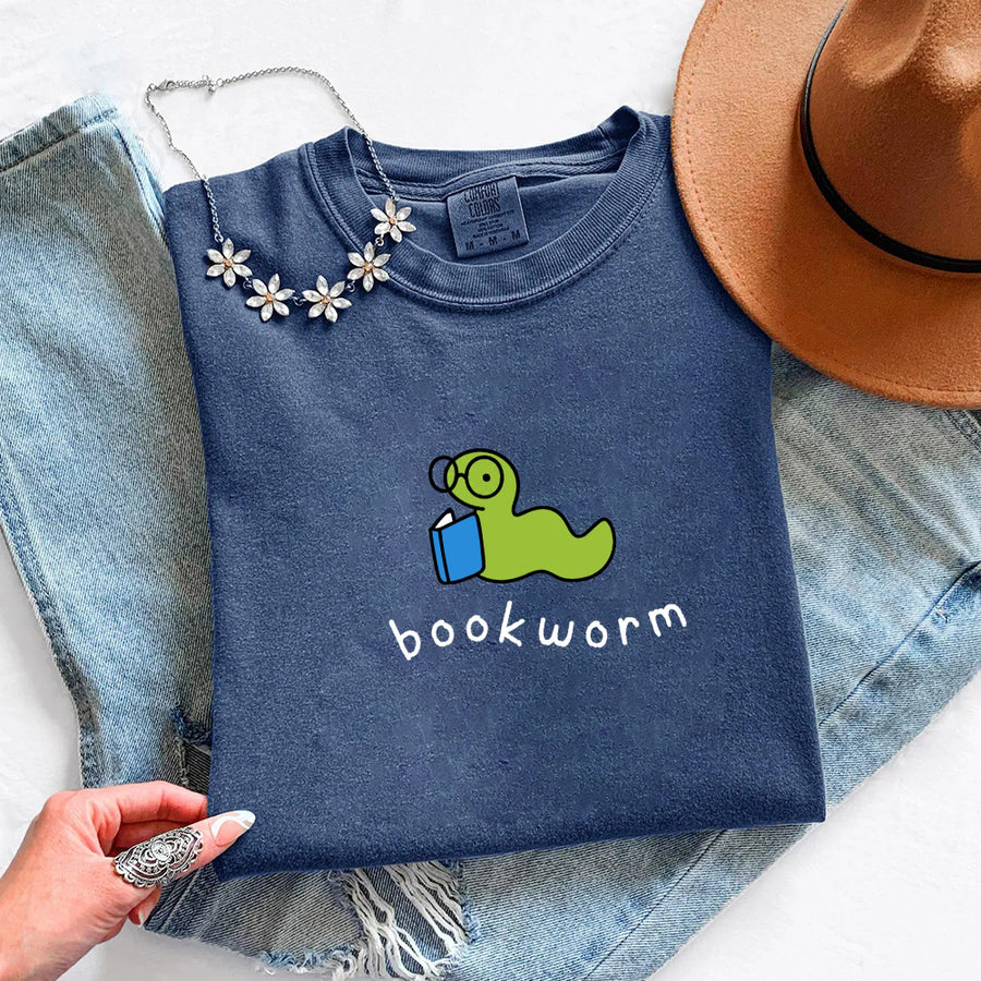 May include Bookworm Comfort Colors unisex t-shirt with book lover graphic, relaxed fit, and soft garment-dyed cotton