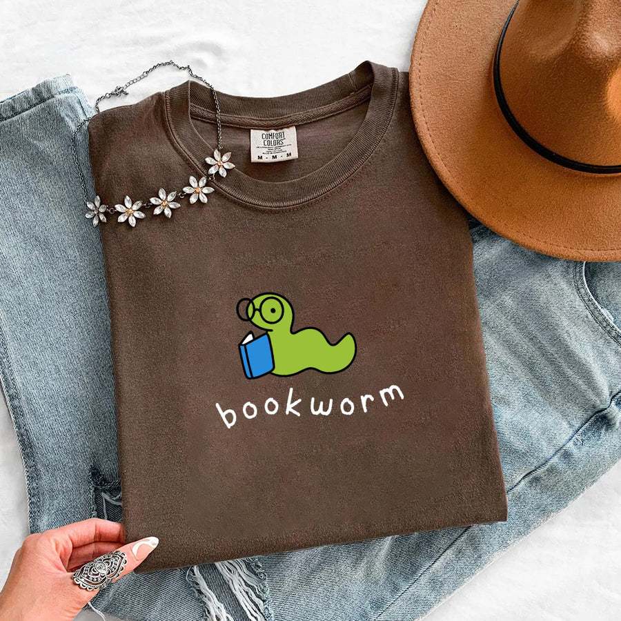 May include Bookworm Comfort Colors unisex t-shirt with book lover graphic, relaxed fit, and soft garment-dyed cotton