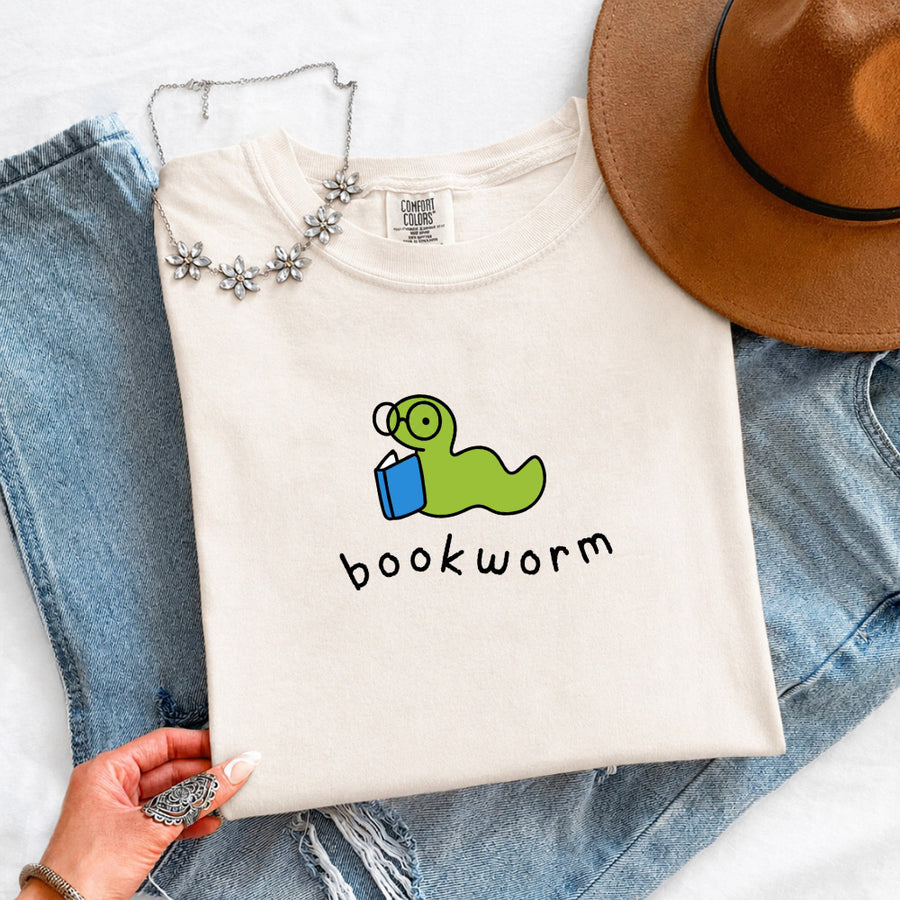 May include Bookworm Comfort Colors unisex t-shirt with book lover graphic, relaxed fit, and soft garment-dyed cotton