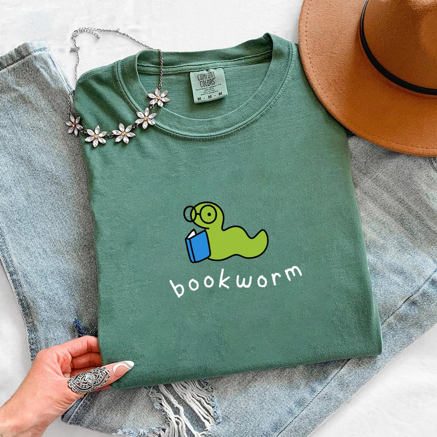 May include Bookworm Comfort Colors unisex t-shirt with book lover graphic, relaxed fit, and soft garment-dyed cotton
