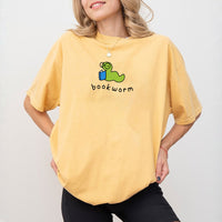 May include Bookworm Comfort Colors unisex t-shirt with book lover graphic, relaxed fit, and soft garment-dyed cotton