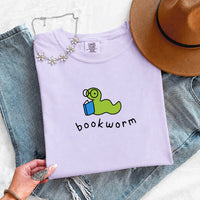 May include Bookworm Comfort Colors unisex t-shirt with book lover graphic, relaxed fit, and soft garment-dyed cotton