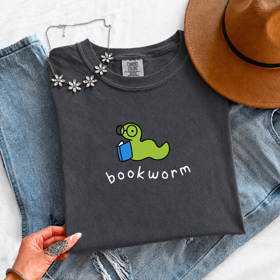 May include Bookworm Comfort Colors unisex t-shirt with book lover graphic, relaxed fit, and soft garment-dyed cotton
