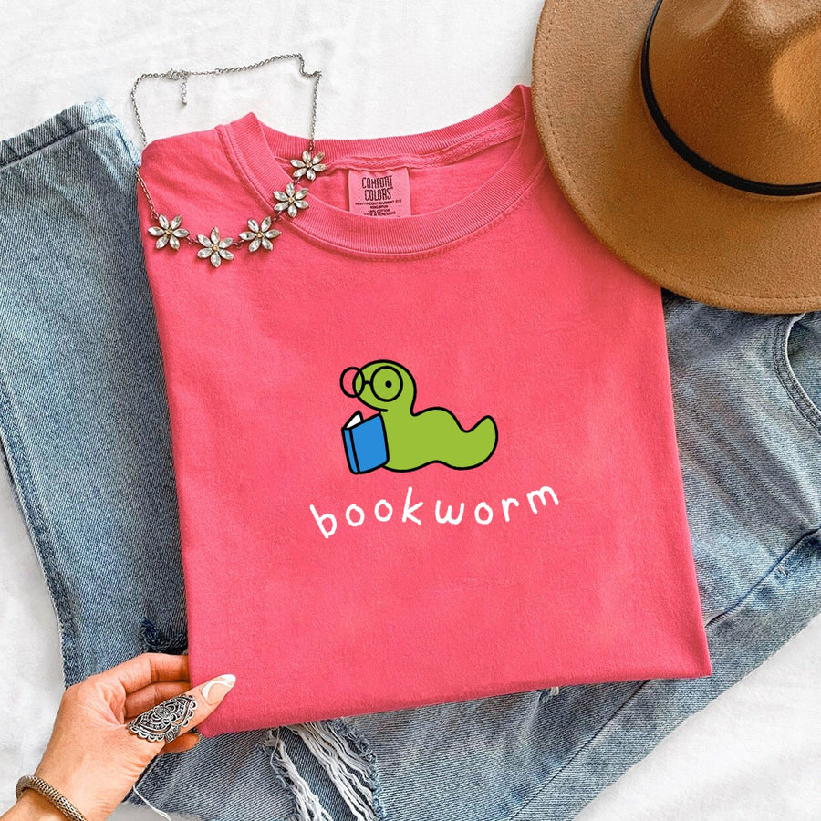 May include Bookworm Comfort Colors unisex t-shirt with book lover graphic, relaxed fit, and soft garment-dyed cotton