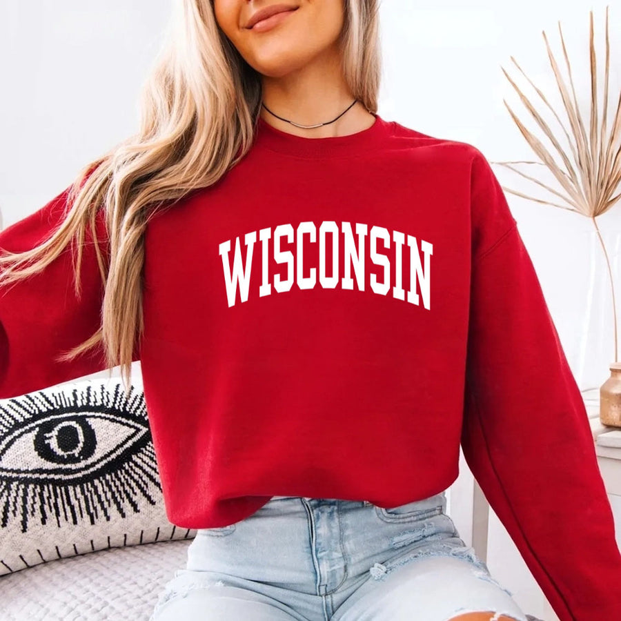 May include Wisconsin crewneck unisex sweatshirt with state-inspired graphic, soft fleece fabric, and classic relaxed fit