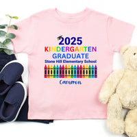 May include colorful text that reads “2025 KINDERGARTEN GRADUATE Stone Hill Elementary School” with a graduation cap over the number “2.” The word "KINDERGARTEN" is in rainbow colors, and the image features a row of multicolored crayons, celebrating a young student’s graduation.