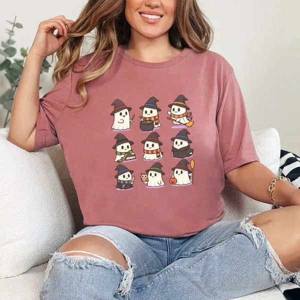 May include a Halloween t-shirt featuring kawaii-style witch ghosts in a spooky-cute design, perfect for fall and Halloween wear.