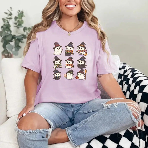 May include a Halloween t-shirt featuring kawaii-style witch ghosts in a spooky-cute design, perfect for fall and Halloween wear.